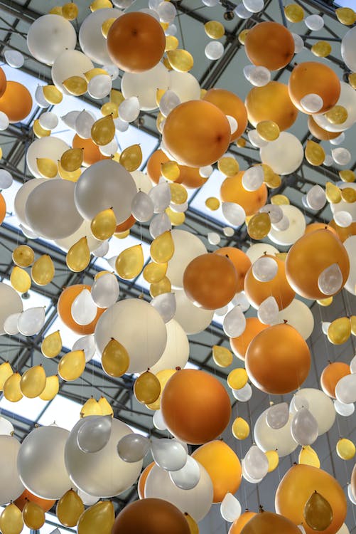 An image of gold and silver balloons.