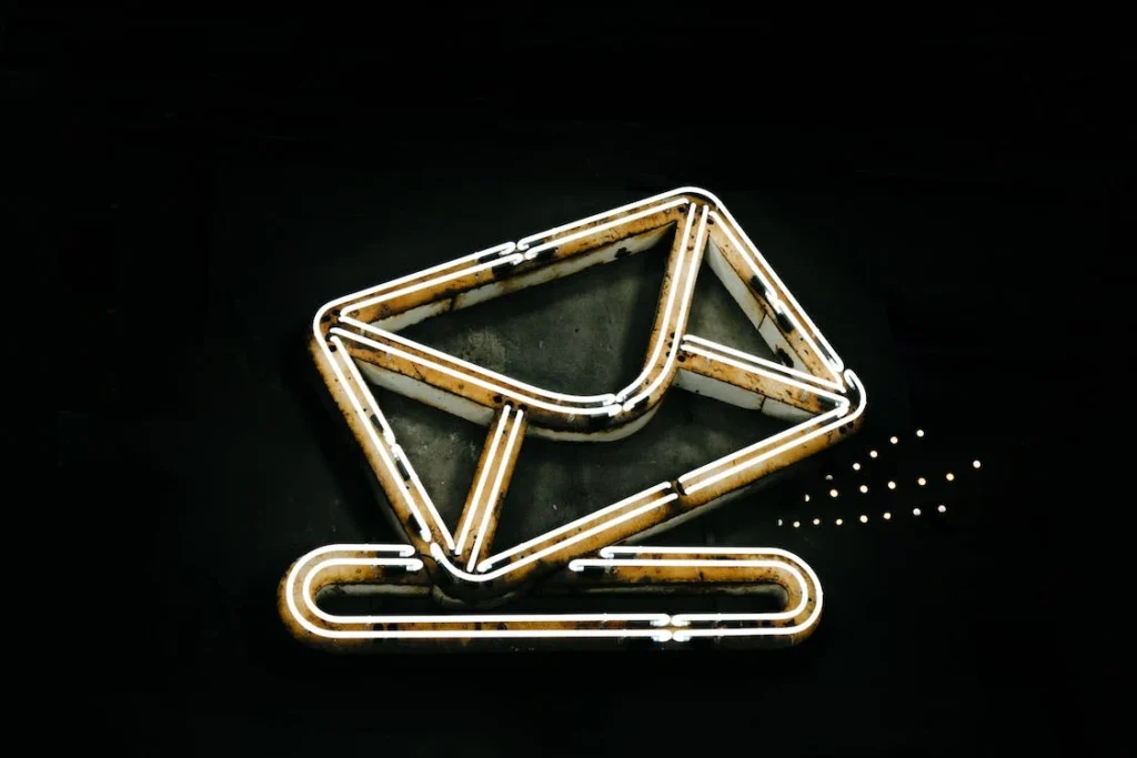 An image of a letter and paperclip icon.