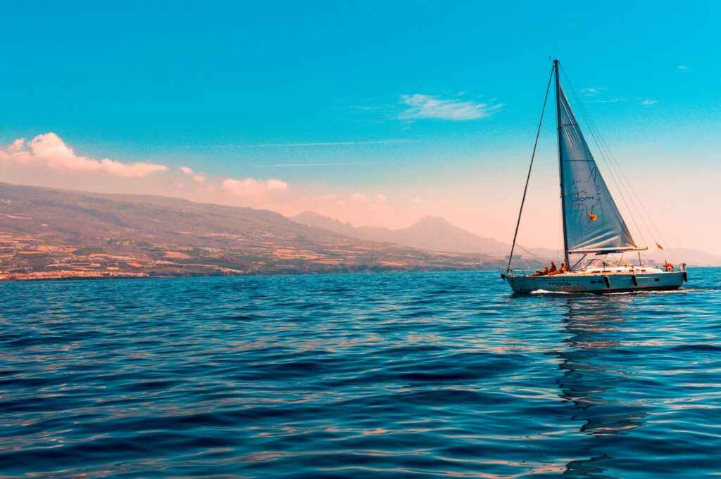 An image of a sailboat on a lake